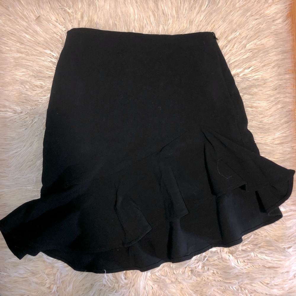 Black ruffled mini skirt